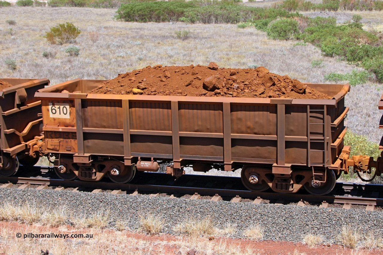 0610 081209 0171
Robe River ore waggon 610, built by Tomlinson Steel WA, fixed coupler non-handbrake side loaded view at the 7 km location just south of Cape Lambert yard. December 9, 2008.
Keywords: 610;Tomlinson-Steel-WA;Robe-ore-waggon;