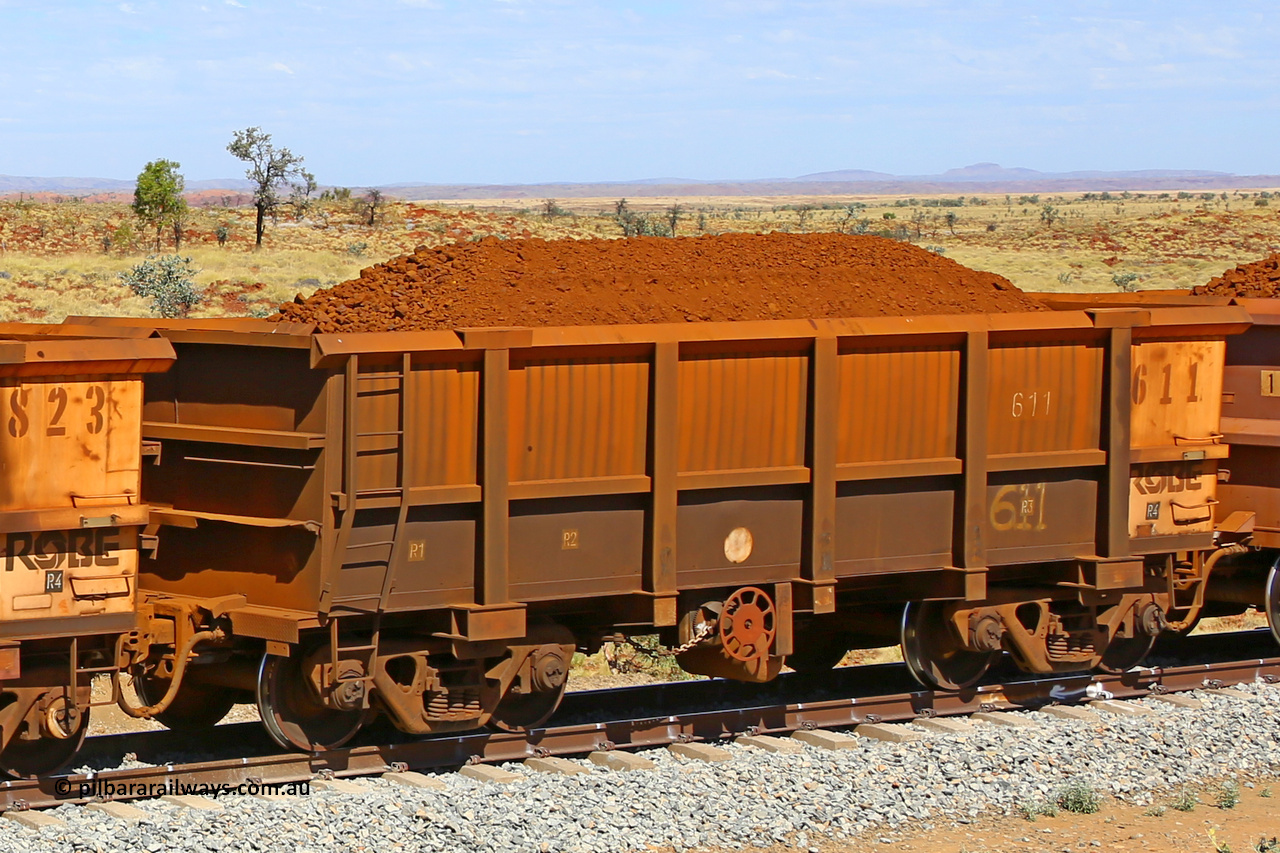0611 170729 0262
Robe River ore waggon 611, built by Tomlinson Steel WA, fixed coupler handbrake side loaded view at the 103 km, between Maitland Siding and the Fortescue River on the Deepdale line. July 29, 2017.
Keywords: 611;Tomlinson-Steel-WA;Robe-ore-waggon;