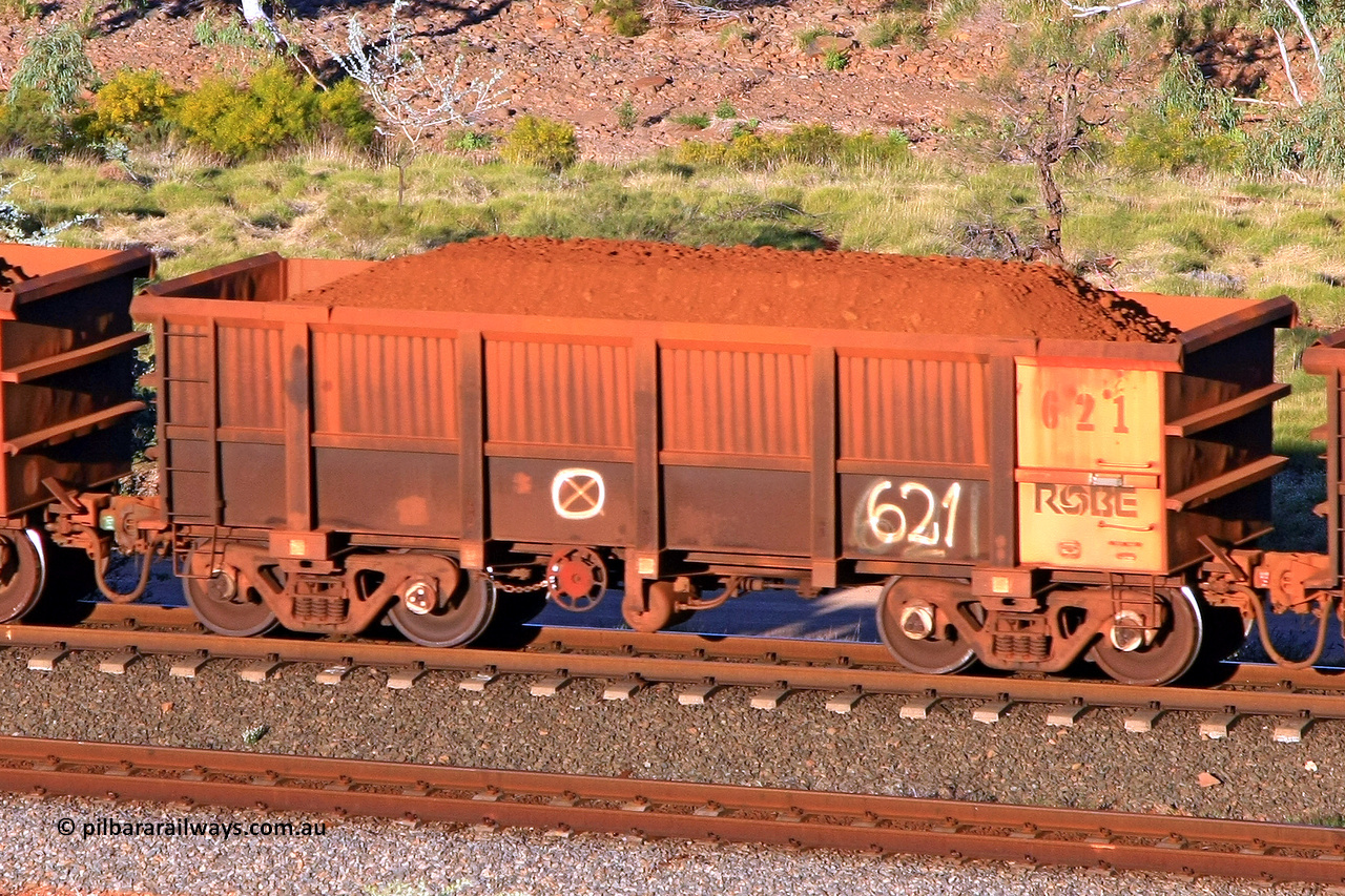 0621 110602 1684
Robe River ore waggon 621, built by Tomlinson Steel WA, rotary coupler end handbrake side loaded view at the 71 km, Western Creek on the Deepdale line. June 2, 2011.
Keywords: 621;Tomlinson-Steel-WA;Robe-ore-waggon;