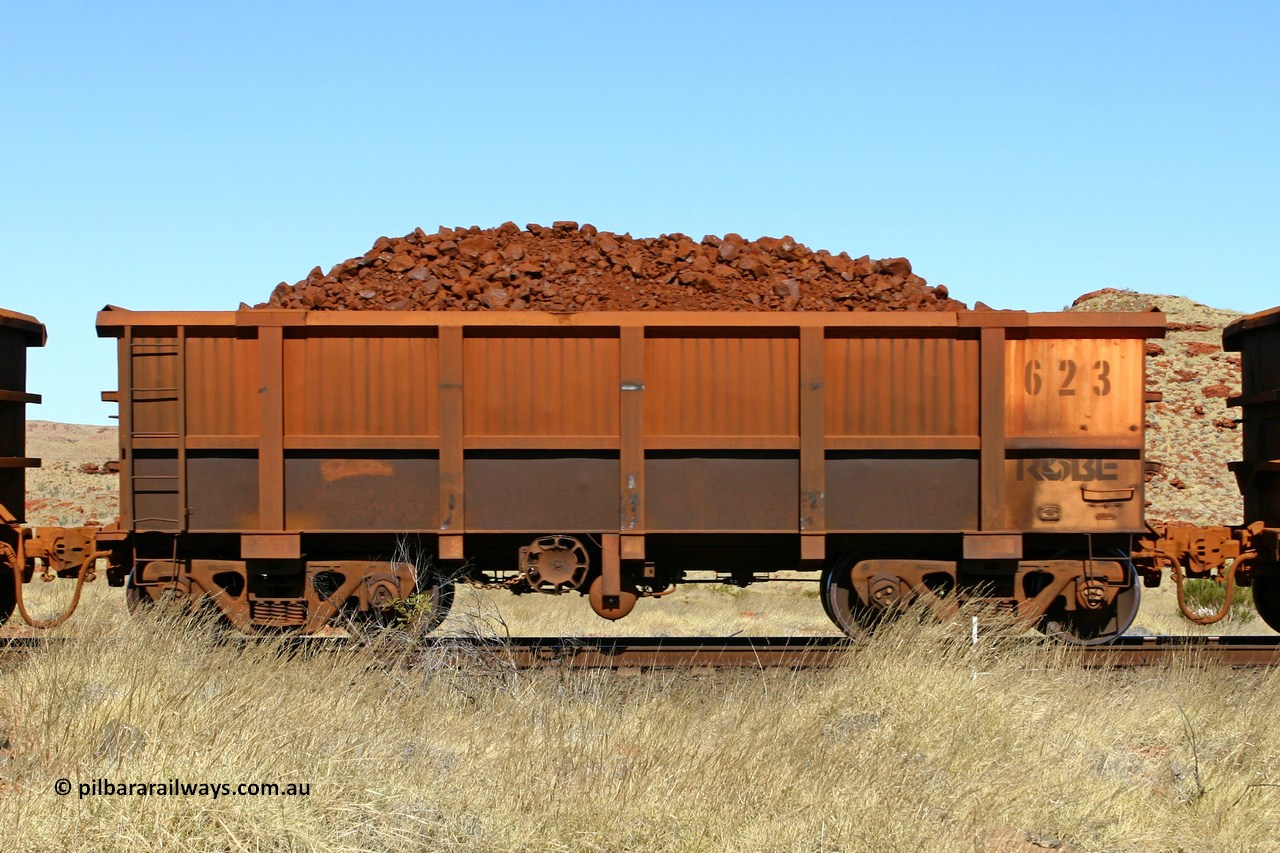 0623 060722 7507
Robe River ore waggon 623, built by Tomlinson Steel WA, handbrake side loaded view at the 78.8 km between Western Creek and Maitland on the Deepdale line. July 22, 2006.
Keywords: 623;Tomlinson-Steel-WA;Robe-ore-waggon;