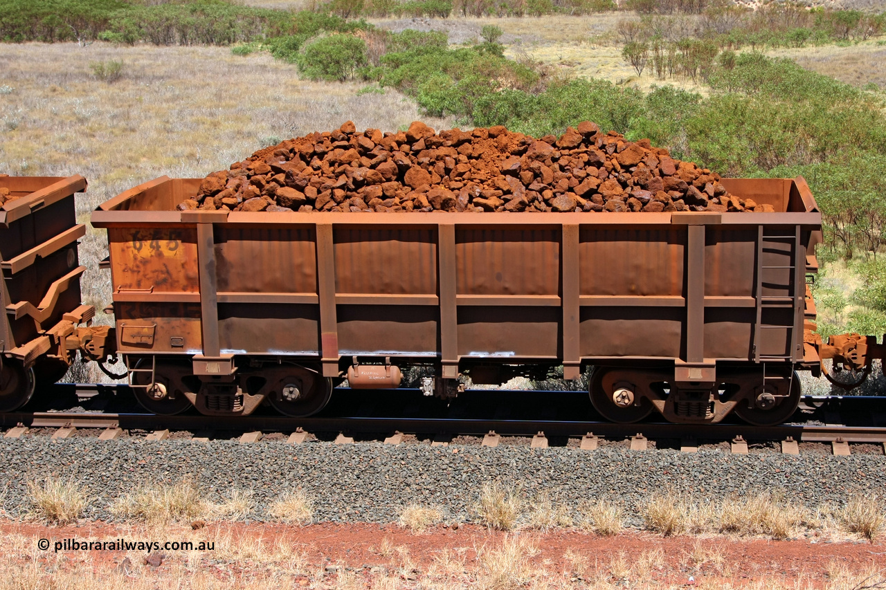 0645 081209 0127
Robe River ore waggon 645, built by Tomlinson Steel WA, fixed coupler non-handbrake side loaded view at the 7 km location just south of Cape Lambert yard. December 9, 2008.
Keywords: 645;Tomlinson-Steel-WA;Robe-ore-waggon;