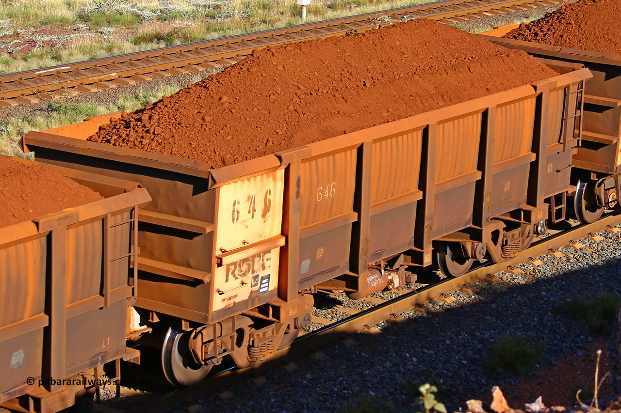 0646 210322 9695
Robe River ore waggon 646, built by Tomlinson Steel WA, rotary coupler end non-handbrake side loaded view at the 17 km on the Cape Lambert line, March 22, 2021.
Keywords: 646;Tomlinson-Steel-WA;Robe-ore-waggon;
