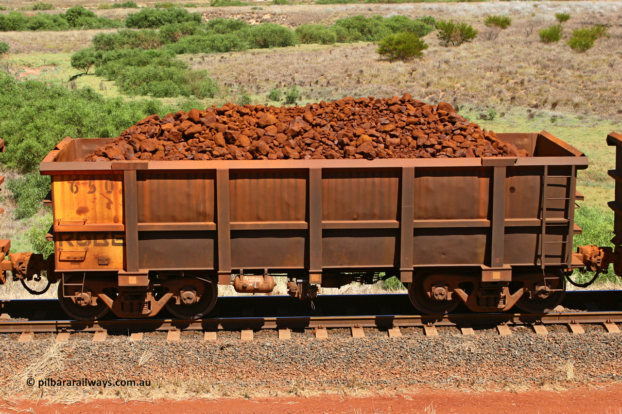 0650 061209 8183
Robe River ore waggon 650, built by Tomlinson Steel WA, non-handbrake side loaded view at the 7 km location just south of Cape Lambert yard. December 9, 2006.
Keywords: 650;Tomlinson-Steel-WA;Robe-ore-waggon;