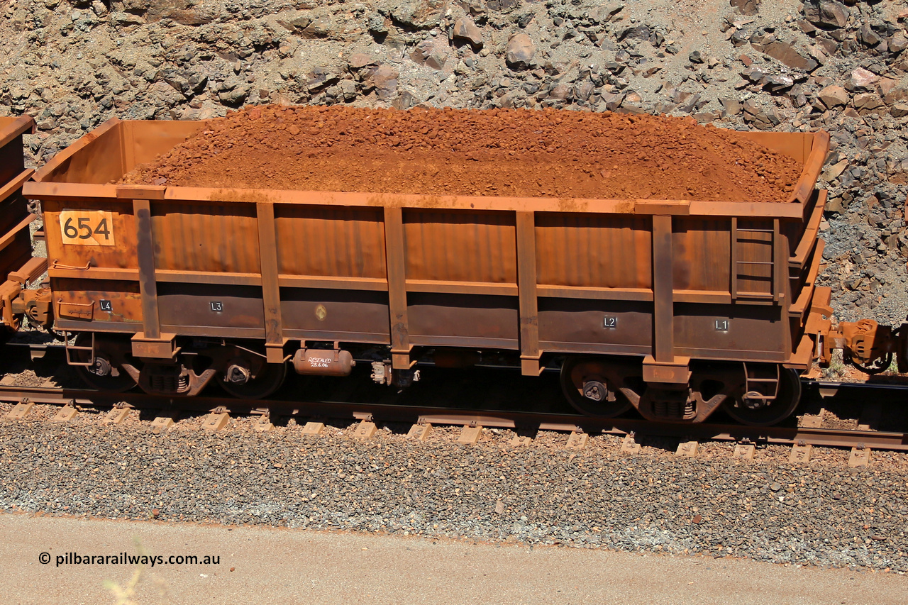 0654 160306 1649
Robe River ore waggon 654, built by Tomlinson Steel WA, fixed coupler non-handbrake side loaded view, at the 45 km, Harding Siding on the Cape Lambert line. March 6, 2016.
Keywords: 654;Tomlinson-Steel-WA;Robe-ore-waggon;