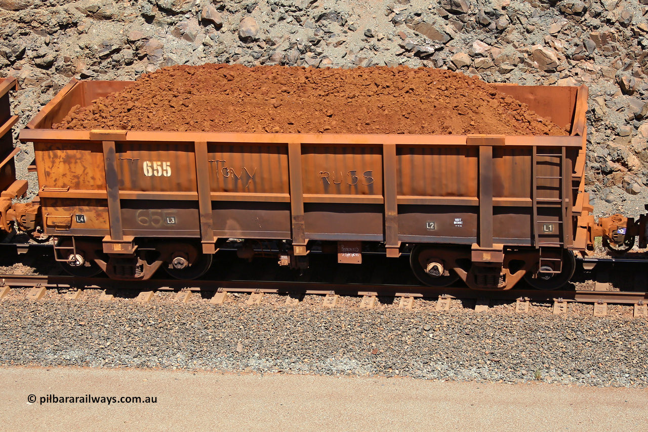 0655 160306 1530
Robe River ore waggon 655, built by Tomlinson Steel WA, fixed coupler non-handbrake side loaded view, at the 45 km, Harding Siding on the Cape Lambert line. March 6, 2016.
Keywords: 655;Tomlinson-Steel-WA;Robe-ore-waggon;