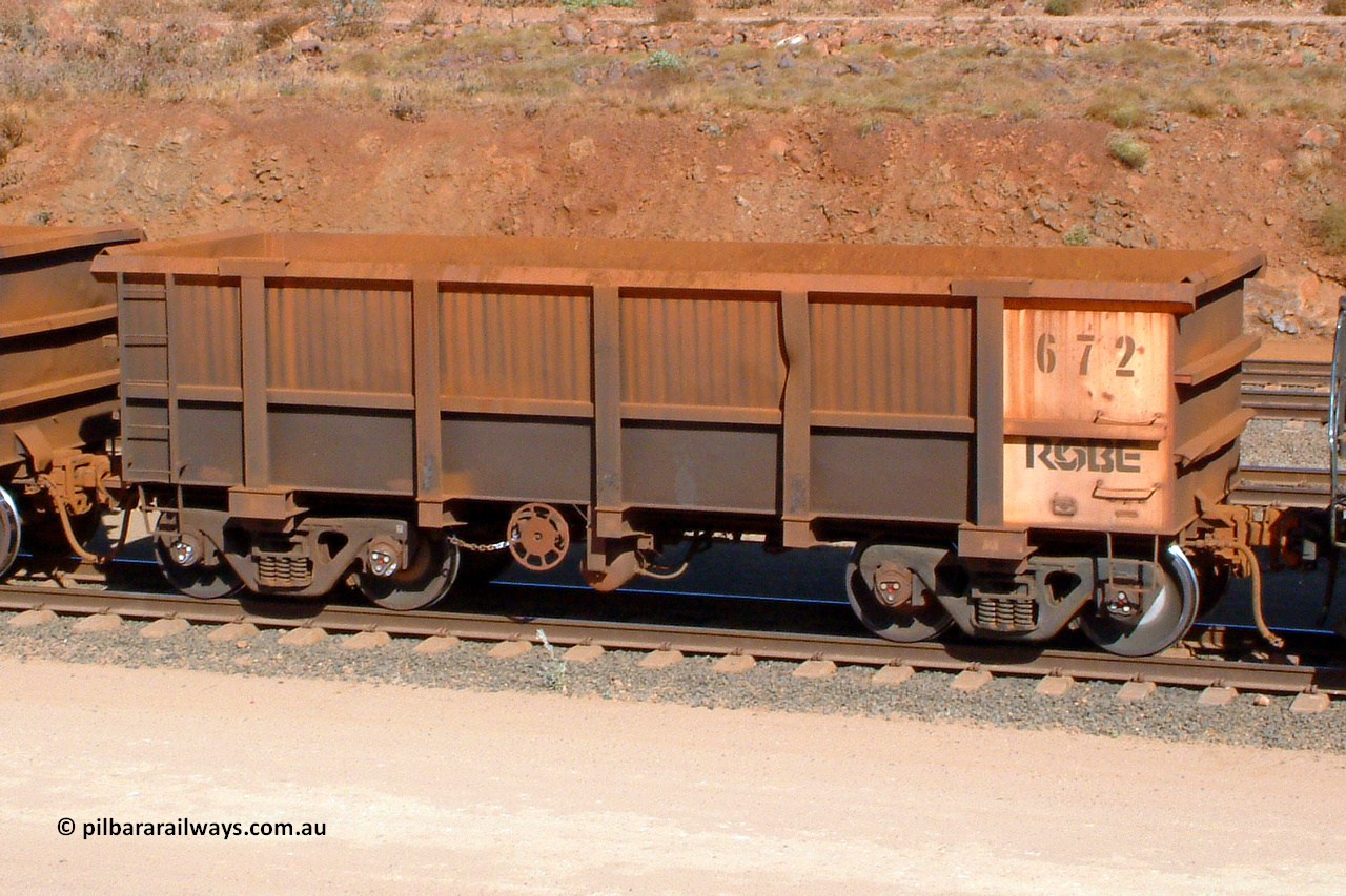 0672 041014 154200
Robe River ore waggon 672, built by Tomlinson Steel WA, rotary coupler end handbrake side empty, Cape Lambert yard. 1542 hours, October 14, 2004.
Keywords: 672;Tomlinson-Steel-WA;Robe-ore-waggon;