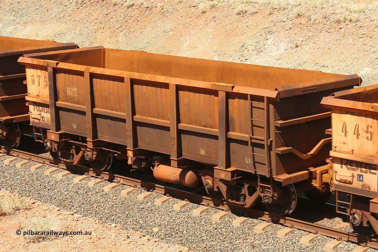 0675 160306 1318
Robe River ore waggon 675, built by Tomlinson Steel WA, fixed coupler non-handbrake side empty view, shows drop rib end, at Greenpool on the Cape Lambert line. March 6, 2016.
Keywords: 675;Tomlinson-Steel-WA;Robe-ore-waggon;