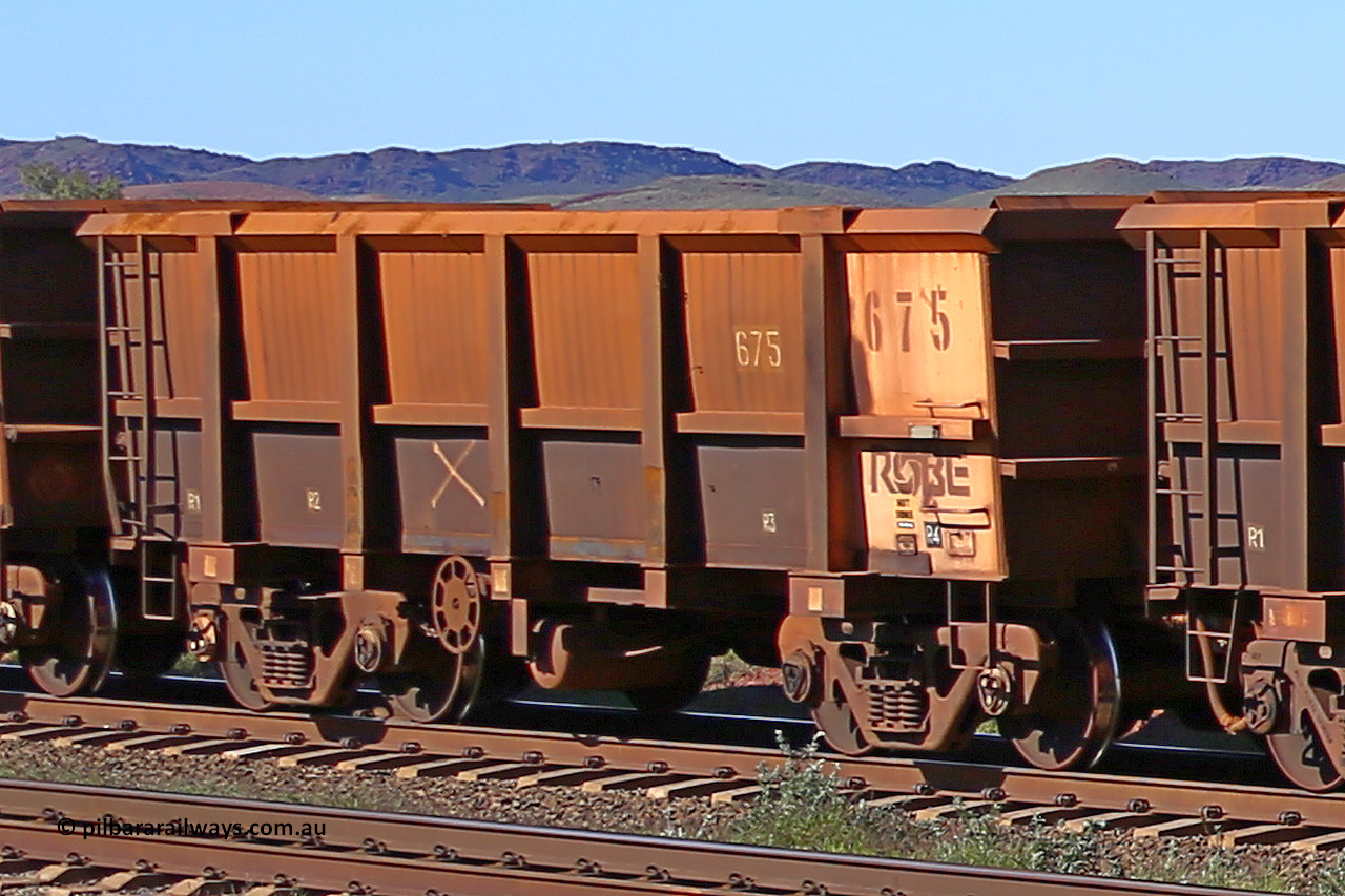 0675 160727 0980
Robe River ore waggon 675, built by Tomlinson Steel WA, rotary coupler end handbrake side empty view at Harding Siding on the Cape Lambert line, July 27, 2016.
Keywords: 675;Tomlinson-Steel-WA;Robe-ore-waggon;