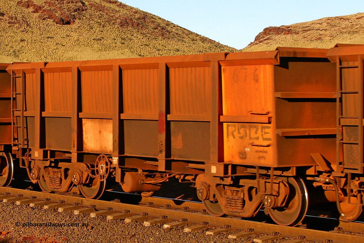 0676 060722 7632
Robe River ore waggon 676, built by Tomlinson Steel WA, rotary coupler end handbrake side empty view, at the 11.7 km, Cape Lambert. July 22, 2006.
Keywords: 676;Tomlinson-Steel-WA;Robe-ore-waggon;