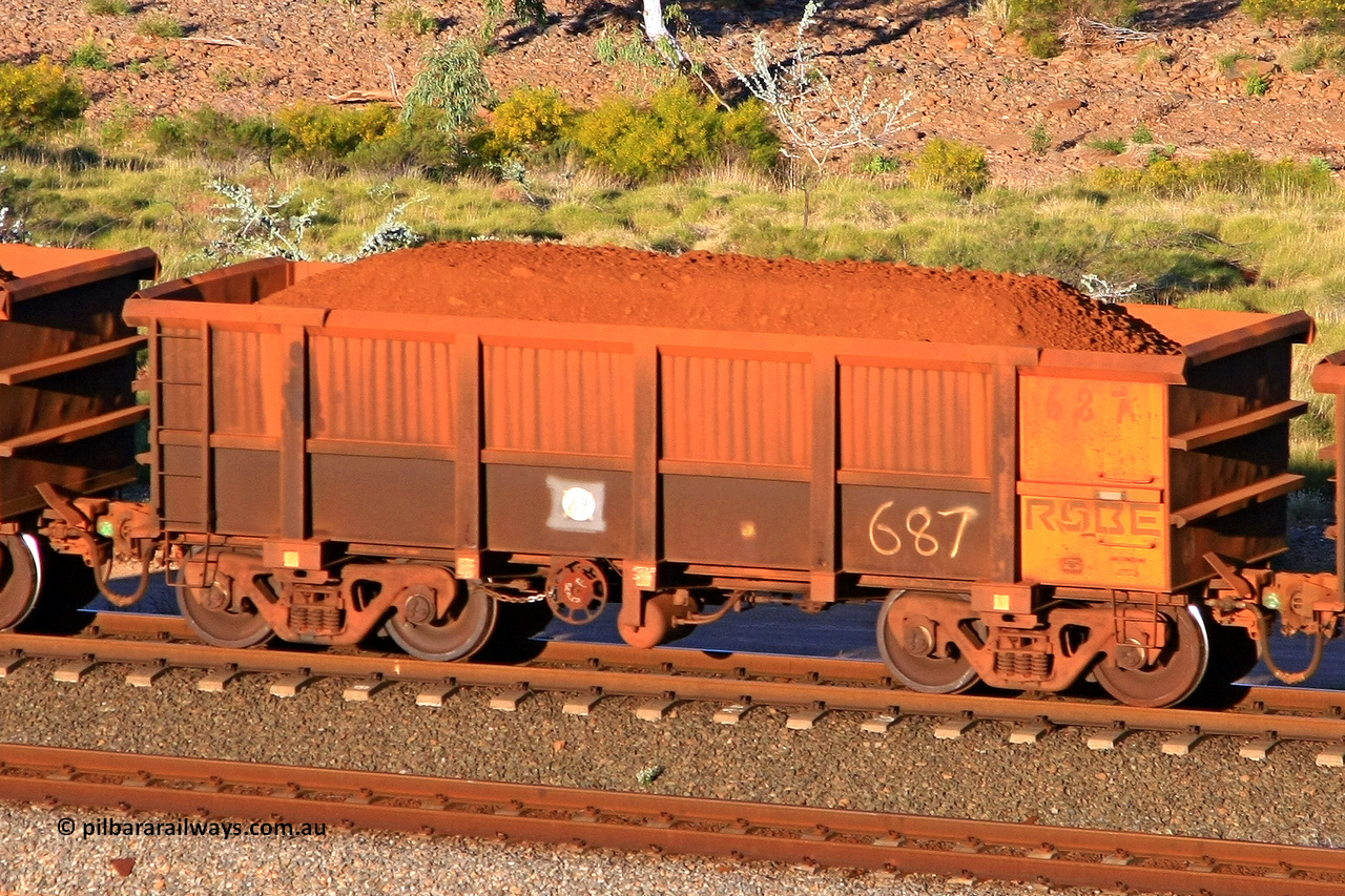 0687 110602 1697
Robe River ore waggon 687, built by Tomlinson Steel WA, rotary coupler end handbrake side loaded view at the 71 km, Western Creek on the Deepdale line. June 2, 2011.
Keywords: 687;Tomlinson-Steel-WA;Robe-ore-waggon;