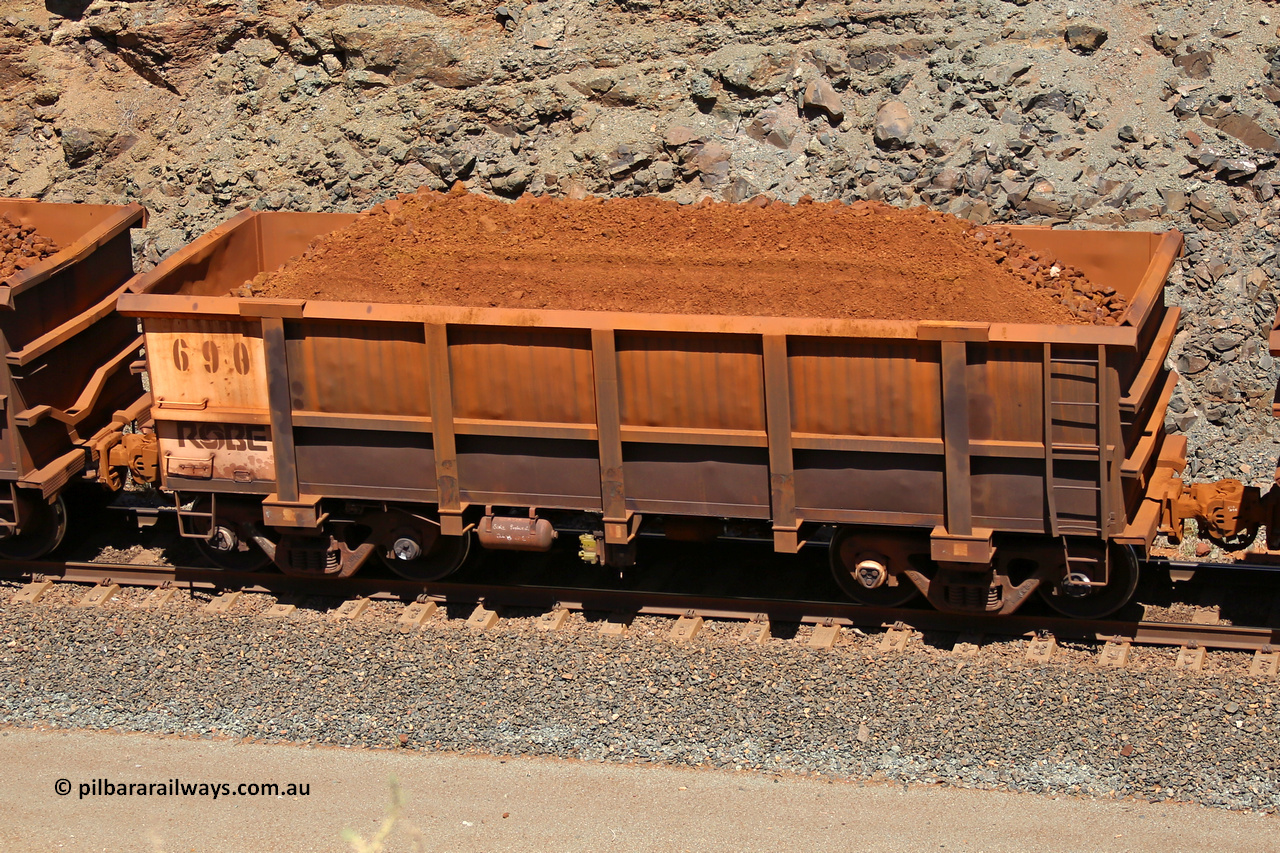 0690 160306 1637
Robe River ore waggon 690, built by Tomlinson Steel WA, fixed coupler non-handbrake side loaded view, at the 45 km, Harding Siding on the Cape Lambert line. March 6, 2016.
Keywords: 690;Tomlinson-Steel-WA;Robe-ore-waggon;