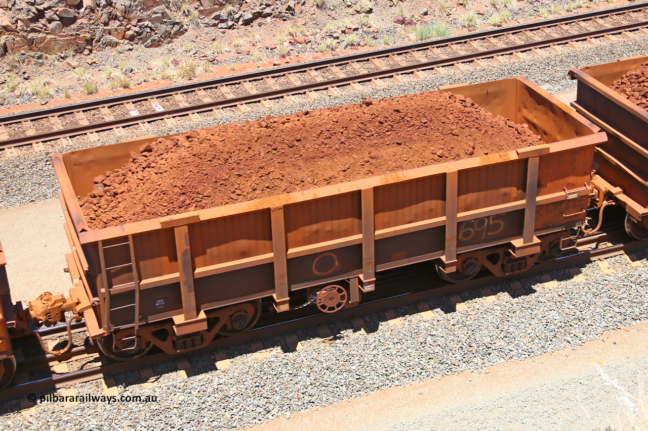 0695 160306 1482
Robe River ore waggon 695, built by Tomlinson Steel WA, fixed coupler handbrake side loaded view, at the 45 km, Harding Siding on the Cape Lambert line. March 6, 2016.
Keywords: 695;Tomlinson-Steel-WA;Robe-ore-waggon;