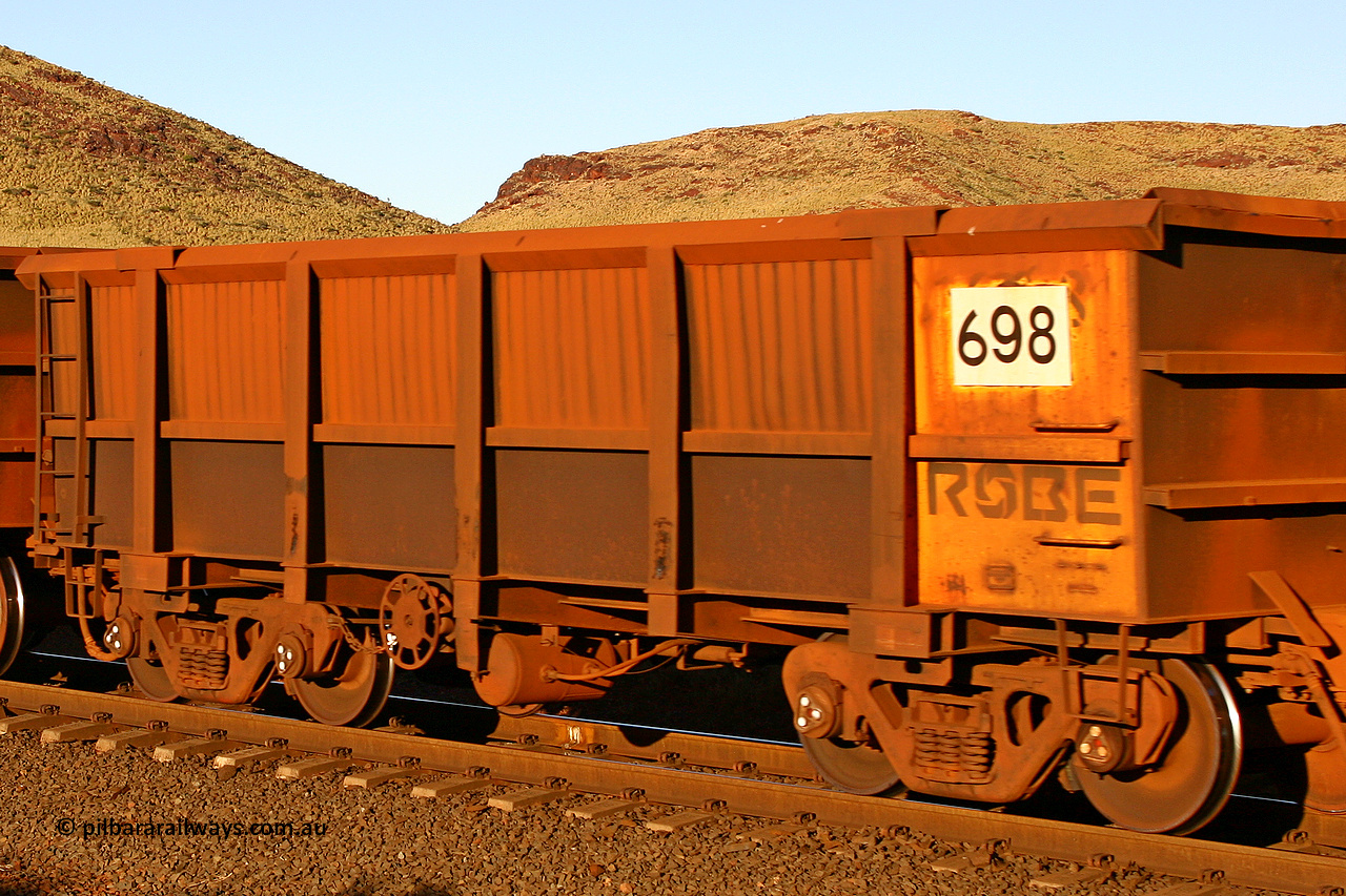 0698 060722 7615
Robe River ore waggon 698, built by Tomlinson Steel WA, rotary coupler end handbrake side empty view, at the 11.7 km, Cape Lambert. July 22, 2006.
Keywords: 698;Tomlinson-Steel-WA;Robe-ore-waggon;