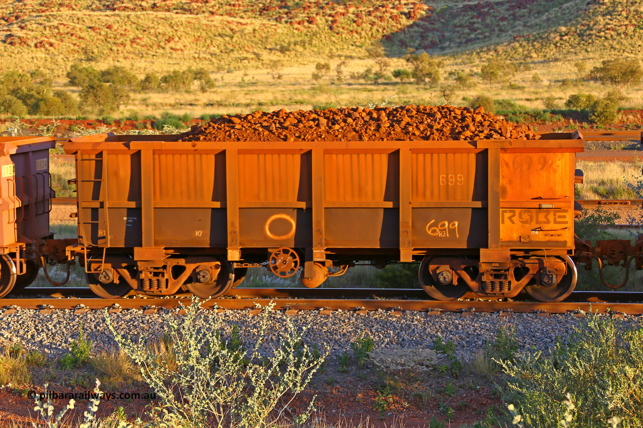 0699 170513 8734
Robe River ore waggon 699, built by Tomlinson Steel WA, rotary coupler end handbrake side loaded view, Cape Lambert yard, May 13, 2017.
Keywords: 699;Tomlinson-Steel-WA;Robe-ore-waggon;