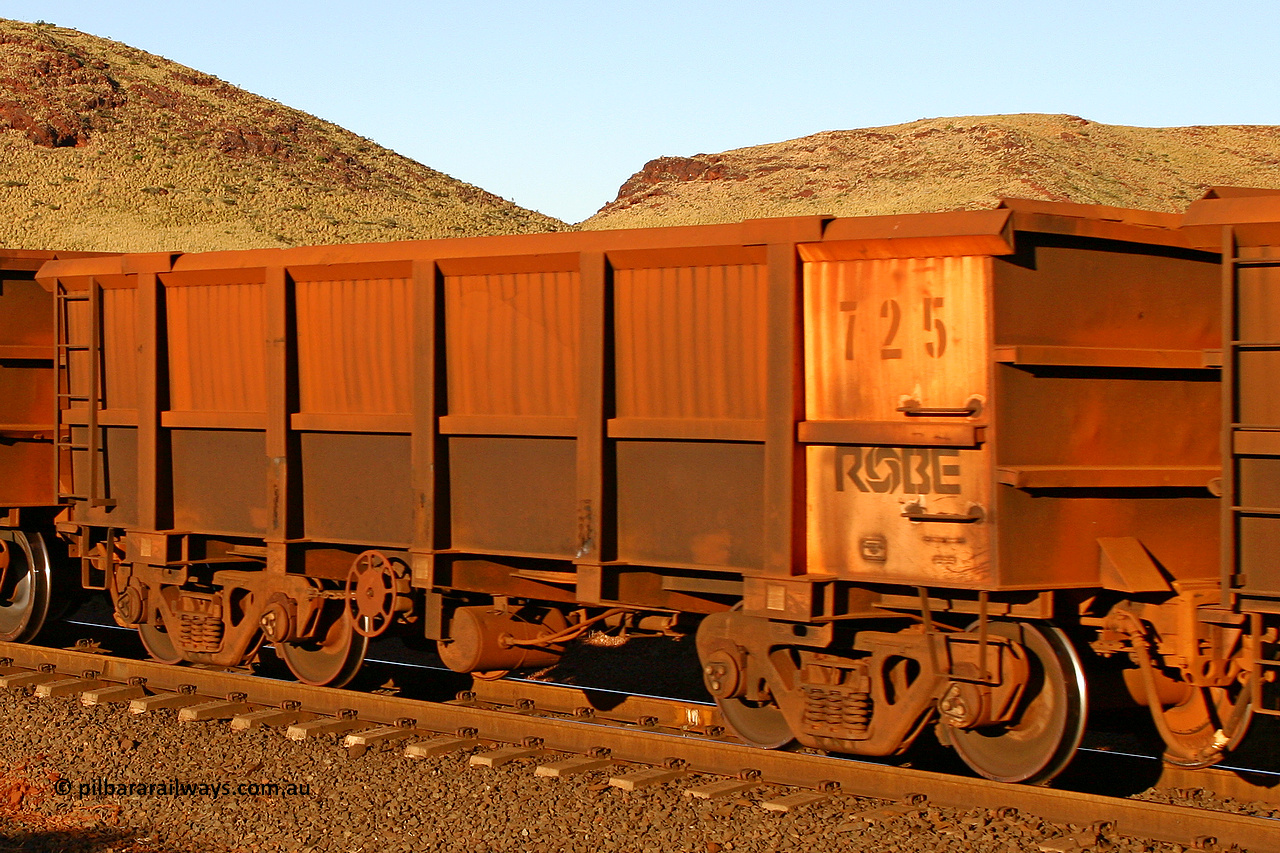 0725 060722 7635
Robe River ore waggon 725, built by Tomlinson Steel WA, rotary coupler end handbrake side empty partial view, at the 11.7 km, Cape Lambert. July 22, 2006.
Keywords: 725;Tomlinson-Steel-WA;Robe-ore-waggon;