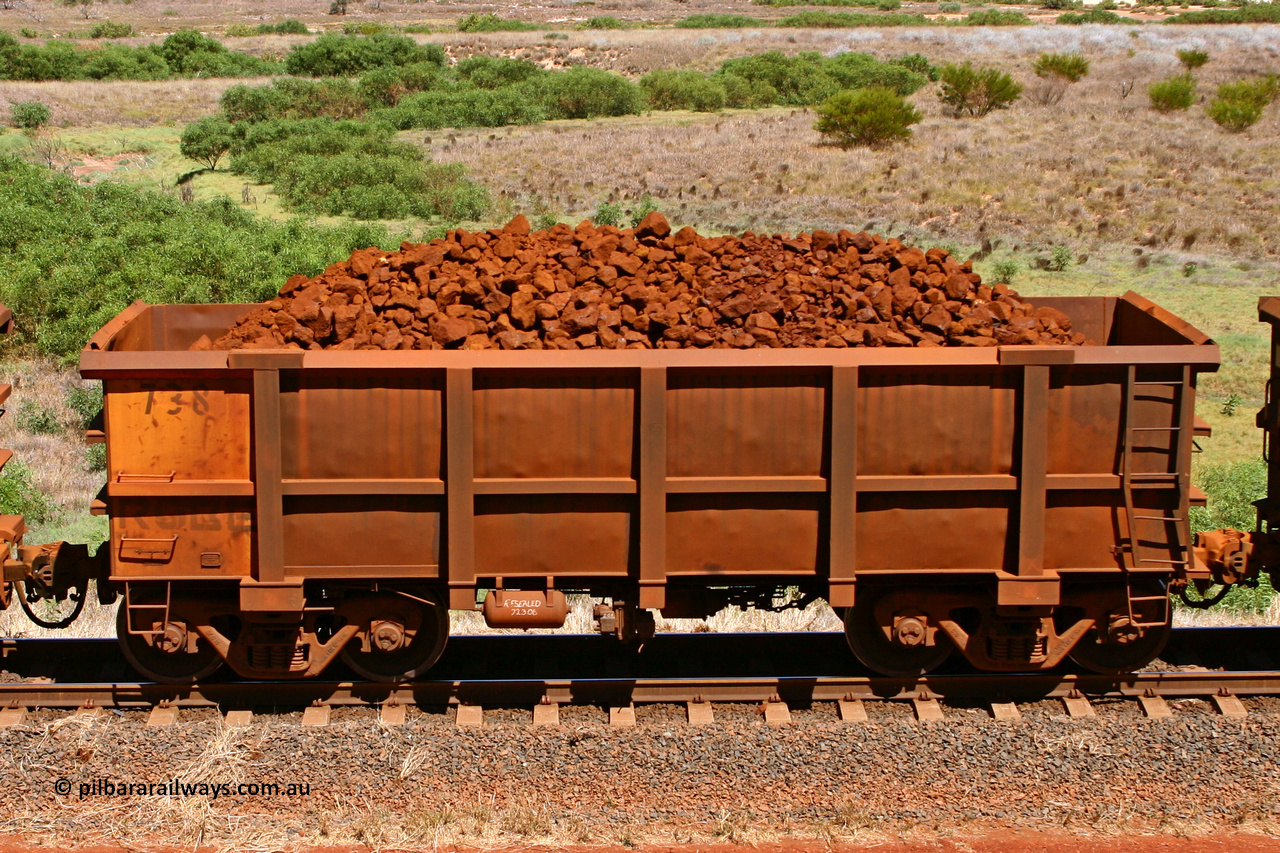 0738 061209 8193
Robe River ore waggon 738, built by Tomlinson Steel WA, non-handbrake side loaded view at the 7 km location just south of Cape Lambert yard. December 9, 2006.
Keywords: 738;Tomlinson-Steel-WA;Robe-ore-waggon;
