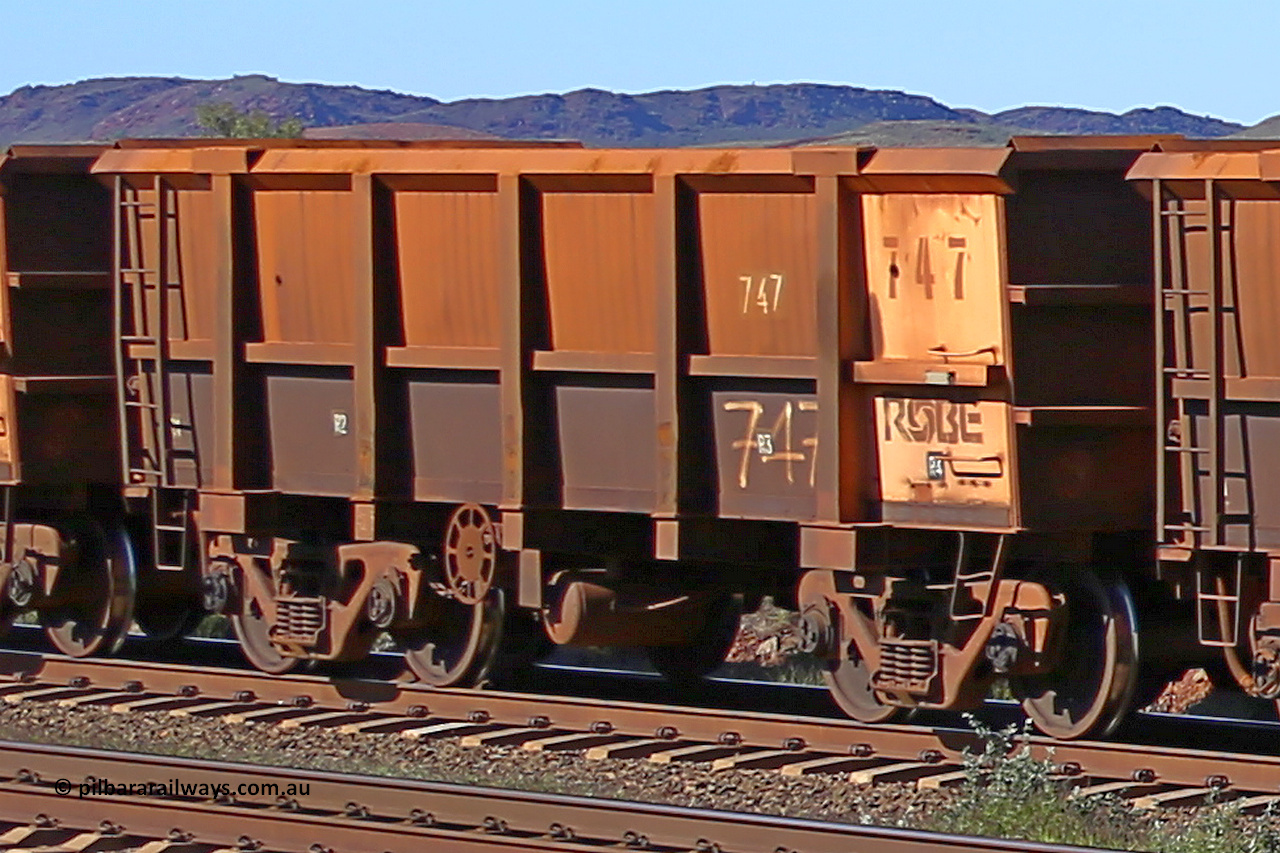 0747 160727 0966
Robe River ore waggon 747, built by Tomlinson Steel WA, rotary coupler end handbrake side empty view at Harding Siding on the Cape Lambert line, July 27, 2016.
Keywords: 747;Tomlinson-Steel-WA;Robe-ore-waggon;