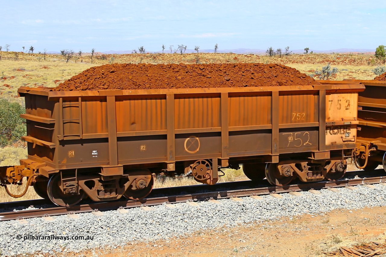 0752 170729 0203
Robe River ore waggon 752, built by Tomlinson Steel WA, fixed coupler handbrake side loaded view at the 103 km, between Maitland Siding and the Fortescue River on the Deepdale line. July 29, 2017.
Keywords: 752;Tomlinson-Steel-WA;Robe-ore-waggon;