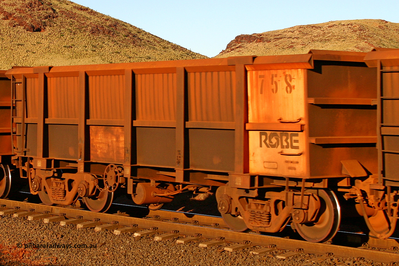 0758 060722 7633
Robe River ore waggon 758, built by Centurion Industries WA, rotary coupler end handbrake side empty partial view, at the 11.7 km, Cape Lambert. July 22, 2006.
Keywords: 758;Centurion-Industries-WA;Robe-ore-waggon;