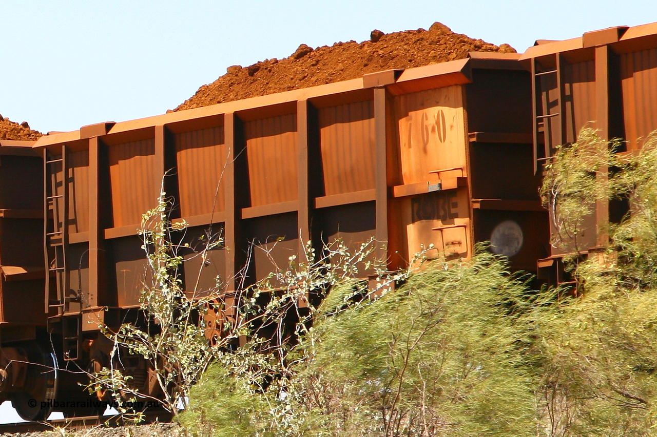 0760 070916 0995
Robe River ore waggon 760, built by Centurion Industries WA, rotary coupler end handbrake side loaded view, obscured from below. Maitland Siding, September 16, 2007.
Keywords: 760;Centurion-Industries-WA;Robe-ore-waggon;