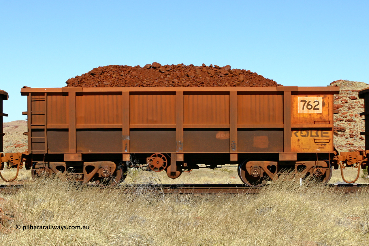 0762 060722 7529
Robe River ore waggon 762, built by Centurion Industries WA, handbrake side loaded view at the 78.8 km between Western Creek and Maitland on the Deepdale line. July 22, 2006.
Keywords: 762;Centurion-Industries-WA;Robe-ore-waggon;