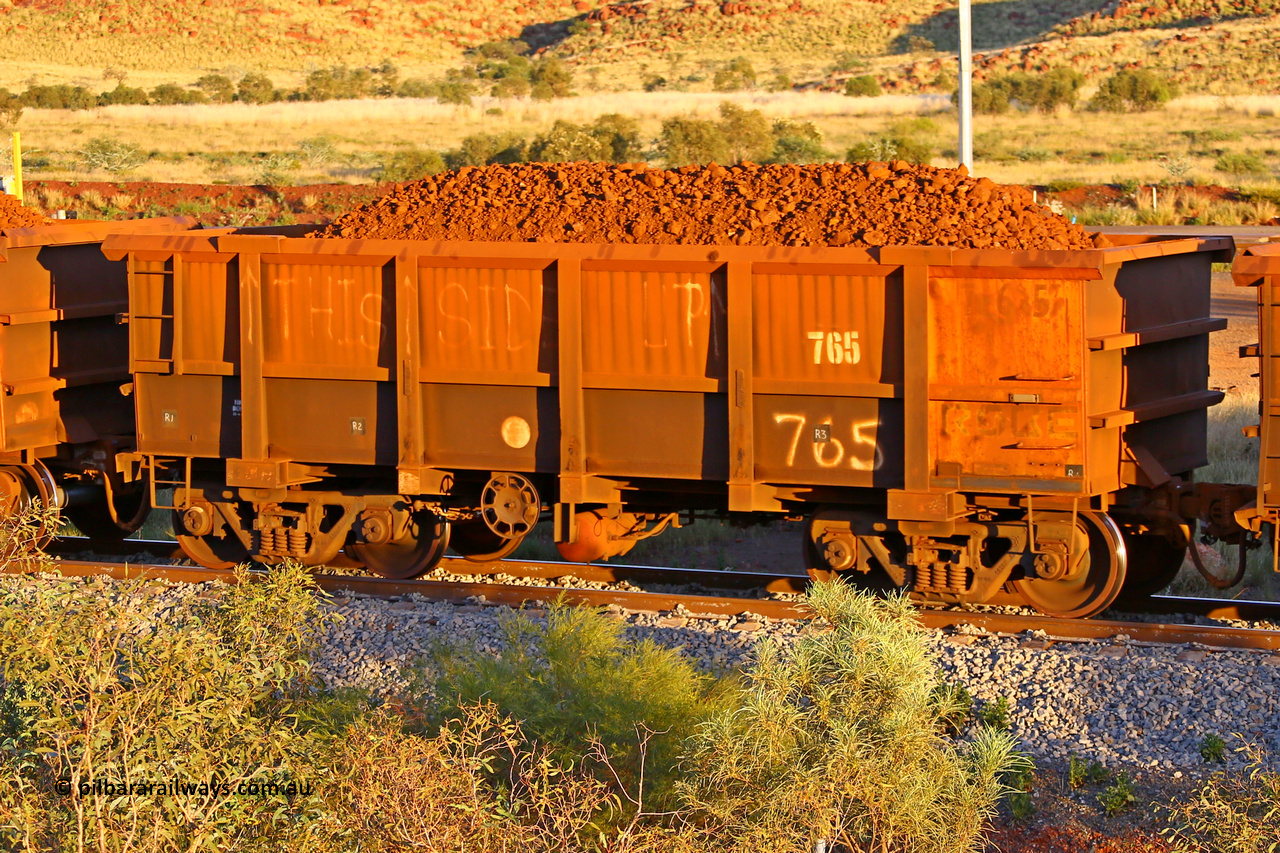 0765 170513 8629
Robe River ore waggon 765, built by Centurion industries WA, rotary coupler end handbrake side loaded view, word say THIS SIDE UP with arrows following a prior derailment, Cape Lambert yard, May 13, 2017.
Keywords: 765;Centurion-Industries-WA;Robe-ore-waggon;