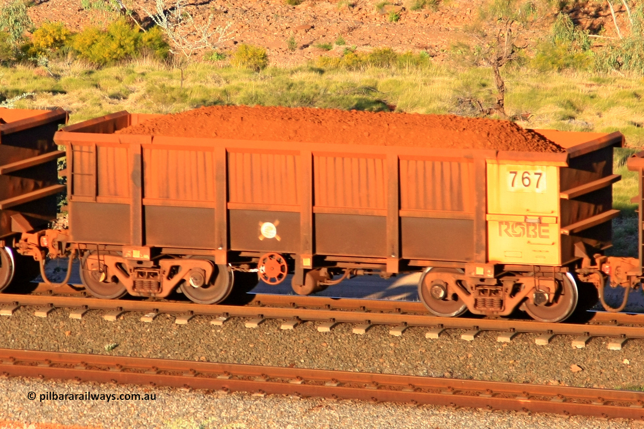 0767 110602 1644
Robe River ore waggon 767, built by Centurion Industries WA, rotary coupler end handbrake side loaded view at the 71 km, Western Creek on the Deepdale line. June 2, 2011.
Keywords: 767;Centurion-Industries-WA;Robe-ore-waggon;