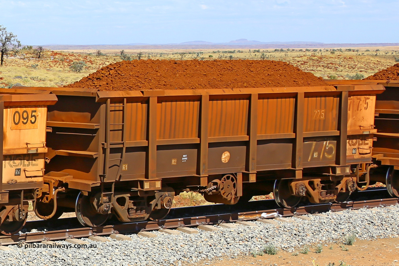 0775 170729 0223
Robe River ore waggon 775, built by Centurion Industries WA, fixed coupler handbrake side loaded view at the 103 km, between Maitland Siding and the Fortescue River on the Deepdale line. July 29, 2017.
Keywords: 775;Centurion-Industries-WA;Robe-ore-waggon;
