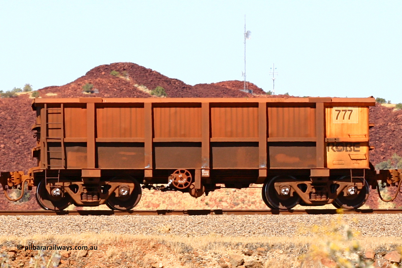 0777 060722 7440
Robe River ore waggon 777, built by Centurion Industries WA, handbrake side empty view at the 45.4 km just south of Harding Siding on the Cape Lambert line. July 22, 2006.
Keywords: 777;Centurion-Industries-WA;Robe-ore-waggon;