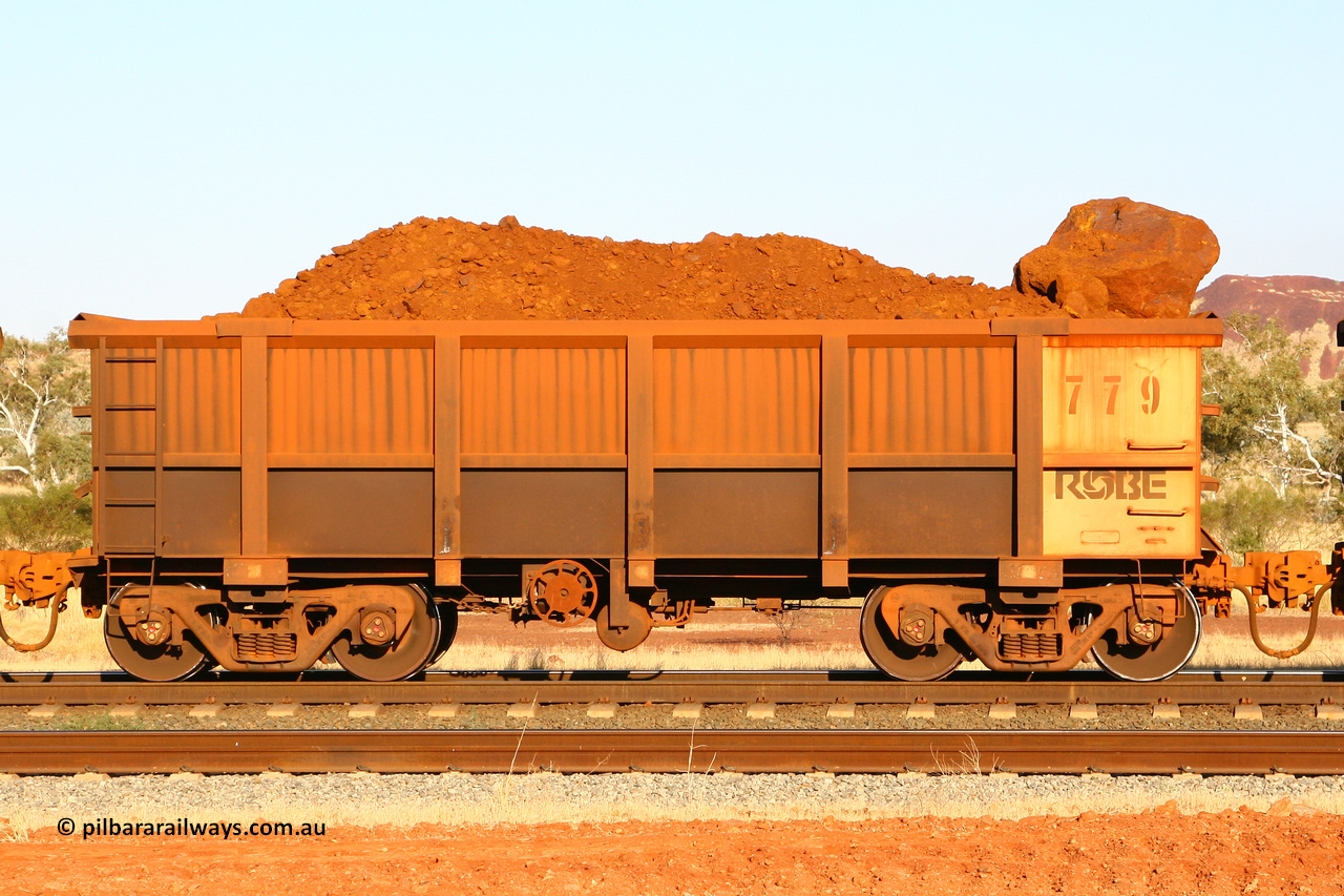 0779 070914 0716
Robe River ore waggon 779, built by Centurion Industries WA, handbrake side loaded view with very large ore rock, Harding Siding on the Cape Lambert line. March 6, 2016.
Keywords: 779;Centurion-Industries-WA;Robe-ore-waggon;