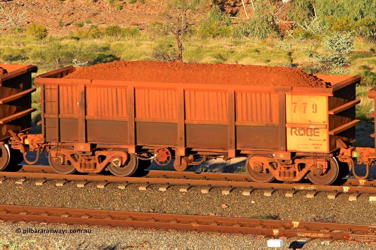 0779 110602 1650
Robe River ore waggon 779, built by Centurion Industries WA, rotary coupler end handbrake side loaded view at the 71 km, Western Creek on the Deepdale line. June 2, 2011.
Keywords: 779;Centurion-Industries-WA;Robe-ore-waggon;