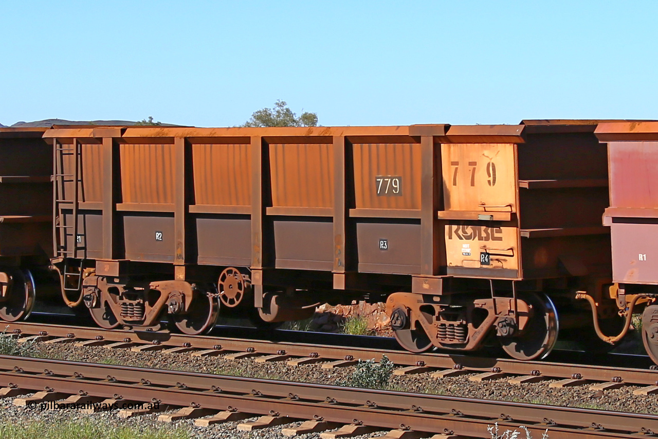 0779 160727 0964
Robe River ore waggon 779, built by Centurion Industries WA, rotary coupler end handbrake side empty view at Harding Siding on the Cape Lambert line, July 27, 2016.
Keywords: 779;Centurion-Industries-WA;Robe-ore-waggon;