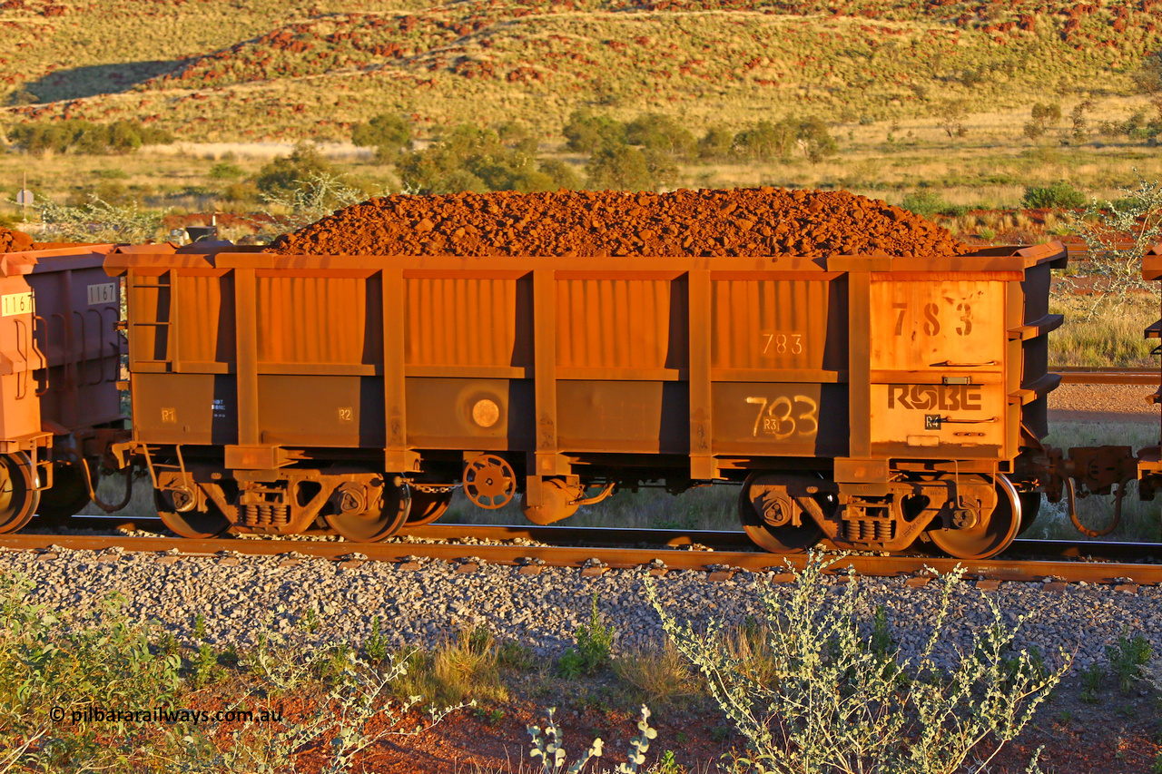 0783 170513 8640
Robe River ore waggon 783, built by Centurion Industries WA, rotary coupler end handbrake side loaded view, Cape Lambert yard, May 13, 2017.
Keywords: 783;Centurion-Industries-WA;Robe-ore-waggon;