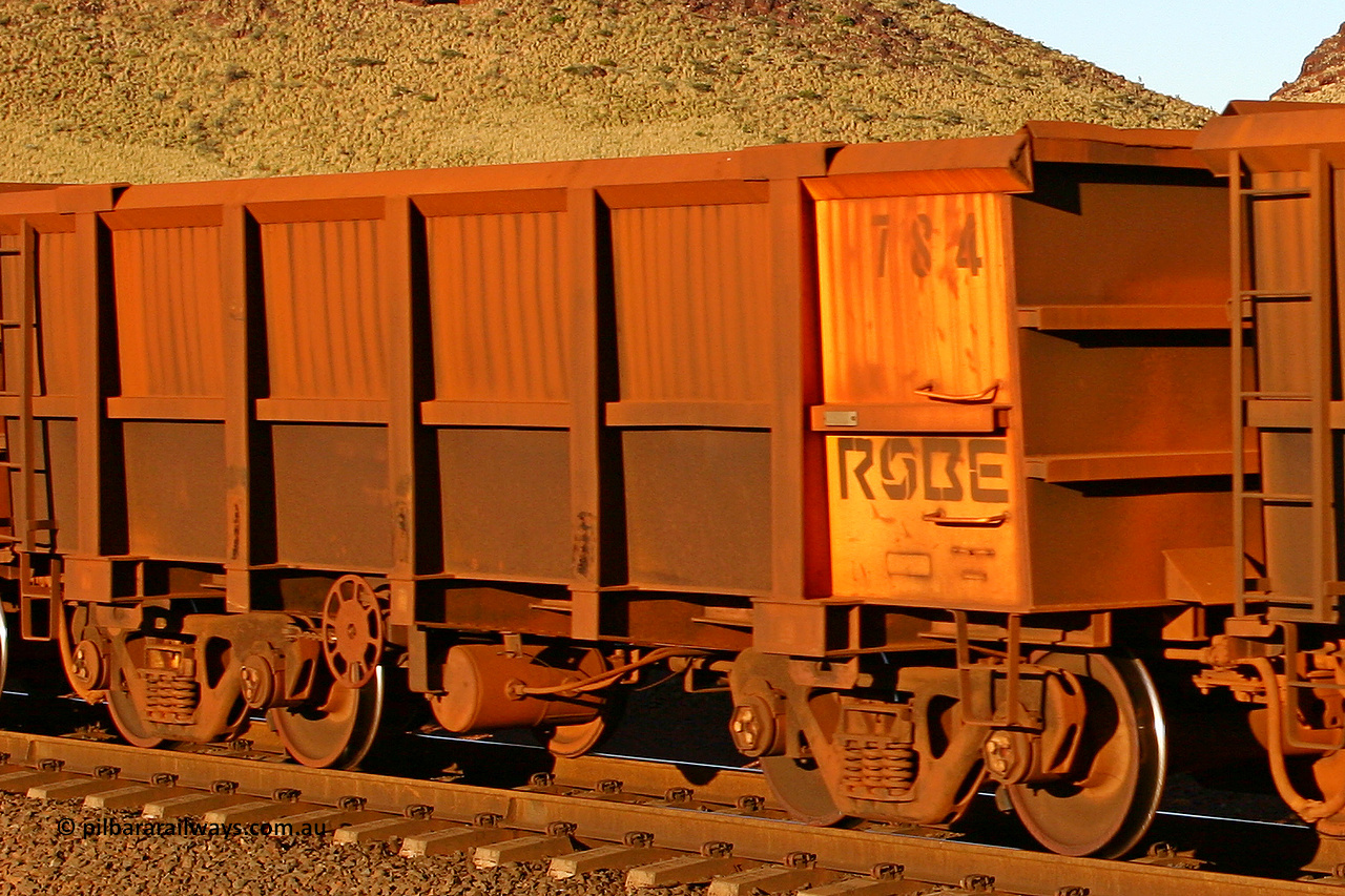 0784 060722 7626
Robe River ore waggon 784, built by Centurion Industries WA, rotary coupler end handbrake side empty view, at the 11.7 km, Cape Lambert. July 22, 2006.
Keywords: 784;Centurion-Industries-WA;Robe-ore-waggon;