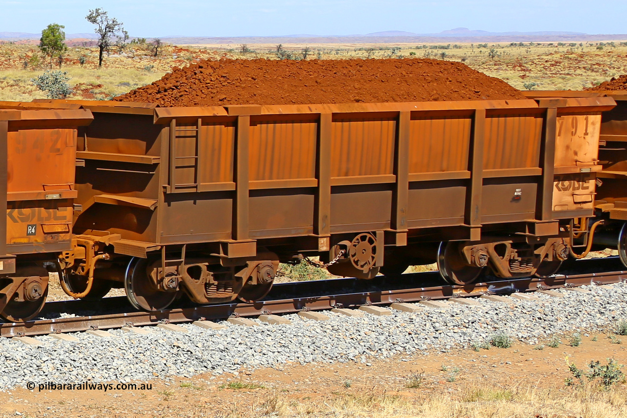 0791 170729 0231
Robe River ore waggon 791, built by Centurion Industries WA, fixed coupler non-handbrake side loaded view, shows drop rib detail, at the 45 km, Harding Siding on the Cape Lambert line. March 6, 2016.
Keywords: 791;Centurion-Industries-WA;Robe-ore-waggon;