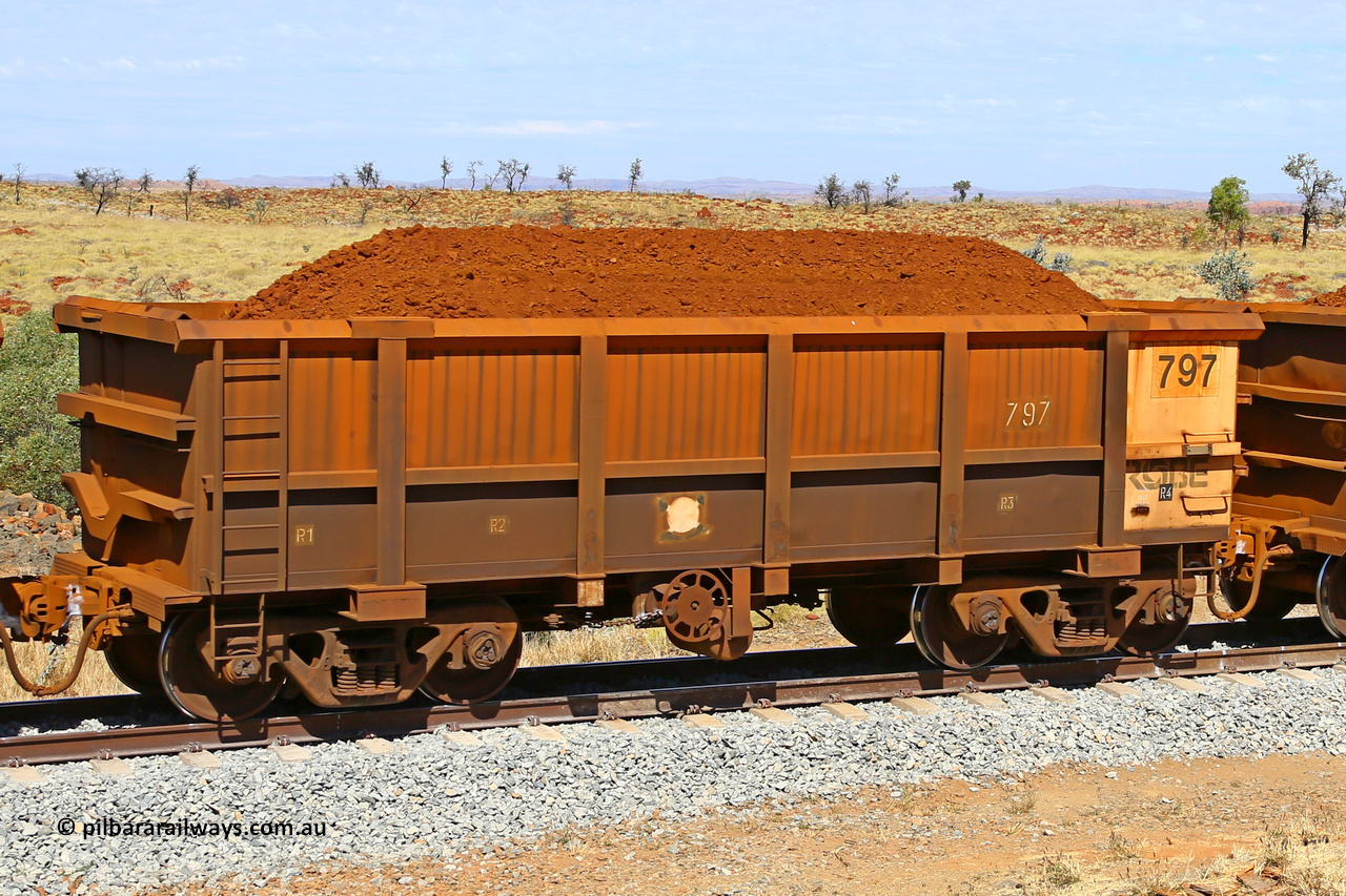 0797 170729 0242
Robe River ore waggon 797, built by Centurion Industries WA, fixed coupler handbrake side loaded view at the 103 km, between Maitland Siding and the Fortescue River on the Deepdale line. July 29, 2017.
Keywords: 797;Centurion-Industries-WA;Robe-ore-waggon;