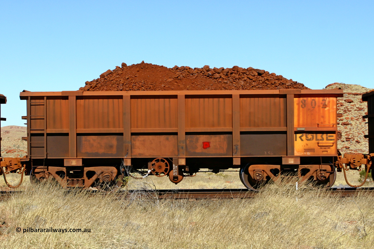 0802 060722 7516
Robe River ore waggon 802, built by Centurion Industries WA, handbrake side loaded view at the 78.8 km between Western Creek and Maitland on the Deepdale line. July 22, 2006.
Keywords: 802;Centurion-Industries-WA;Robe-ore-waggon;