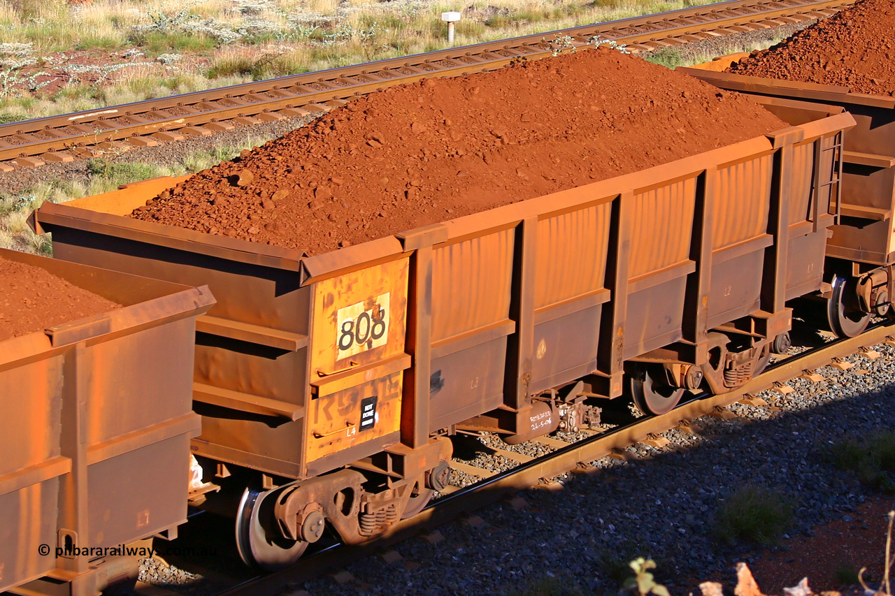 0808 210322 9707
Robe River ore waggon 808, built by Centurion Industries  WA, rotary coupler end non-handbrake side loaded view at the 17 km on the Cape Lambert line, March 22, 2021.
Keywords: 808;Centurion-Industries-WA;Robe-ore-waggon;