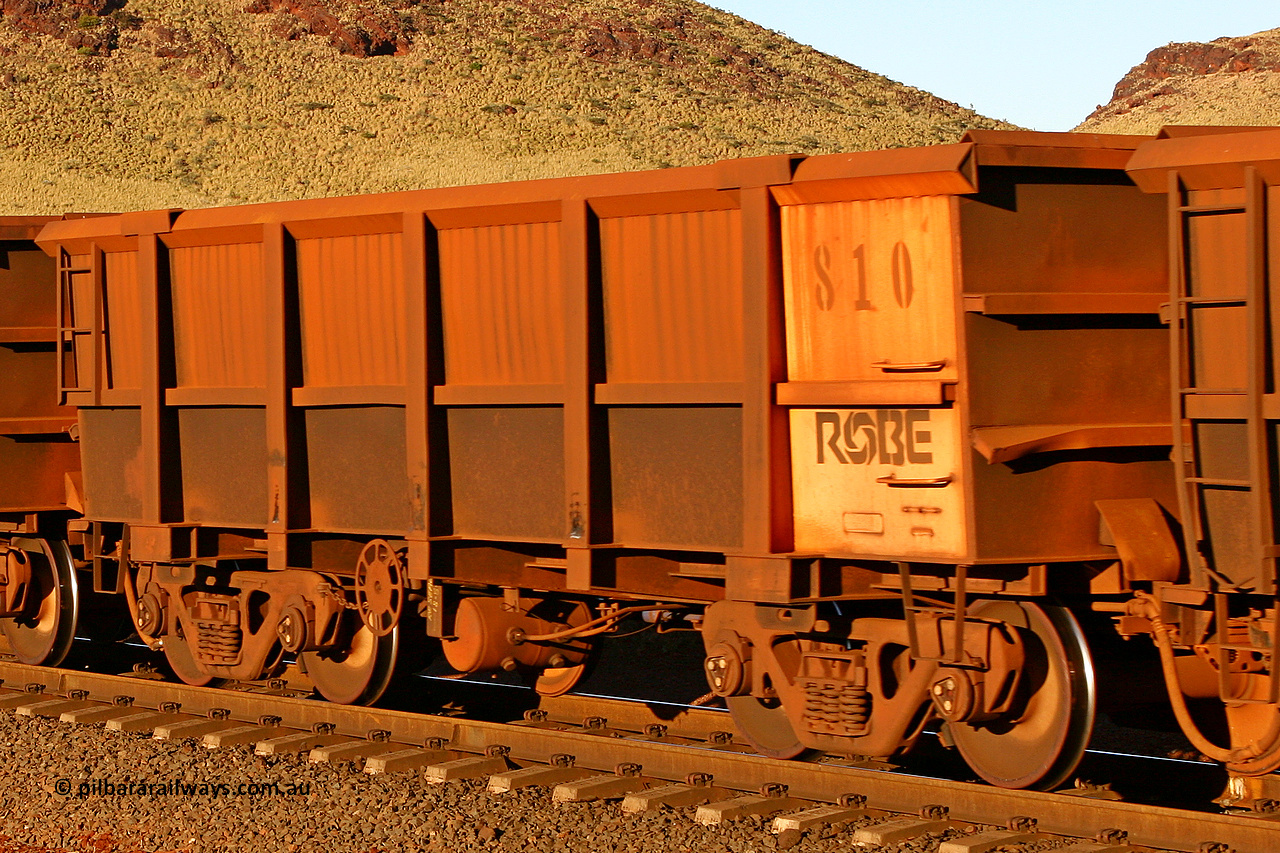 0810 060722 7586
Robe River ore waggon 810, built by Centurion Industries WA, rotary coupler end handbrake side empty view, at the 11.7 km, Cape Lambert. July 22, 2006.
Keywords: 810;Centurion-Industries-WA;Robe-ore-waggon;