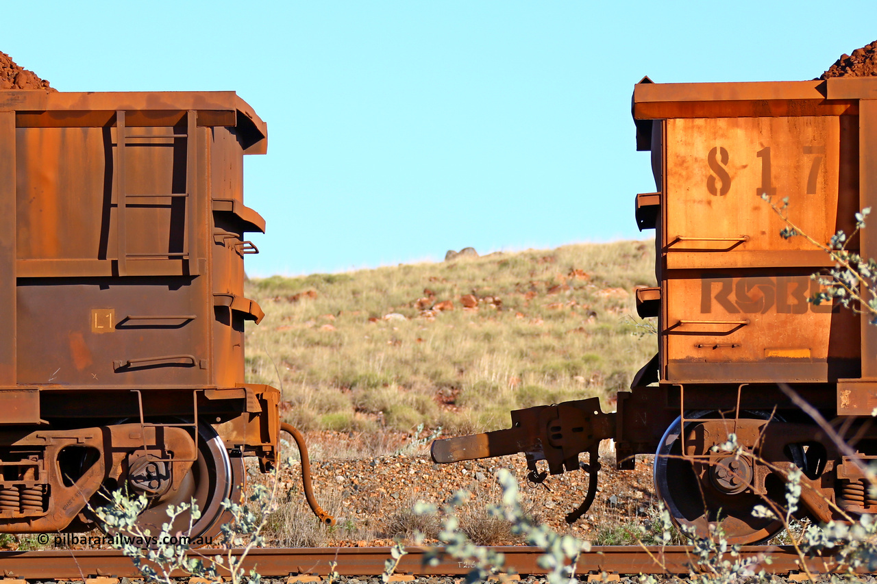 0817 180616 1676
Robe River ore waggon 817, built by Centurion Industries WA, rotary coupler end non-handbrake side loaded view with the pulled fixed coupler from 425 at the 33.7 km, Arches on the Cape Lambert line, June 16, 2018.
Keywords: 817;Centurion-Industries-WA;Robe-ore-waggon;
