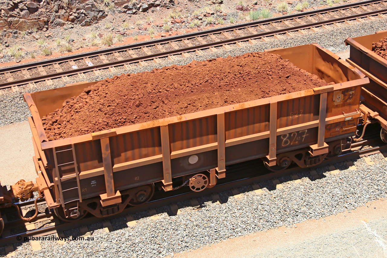0827 160306 1479
Robe River ore waggon 827, built by Centurion Industries WA, fixed coupler handbrake side loaded view, at the 45 km, Harding Siding on the Cape Lambert line. March 6, 2016.
Keywords: 827;Centurion-Industries-WA;Robe-ore-waggon;