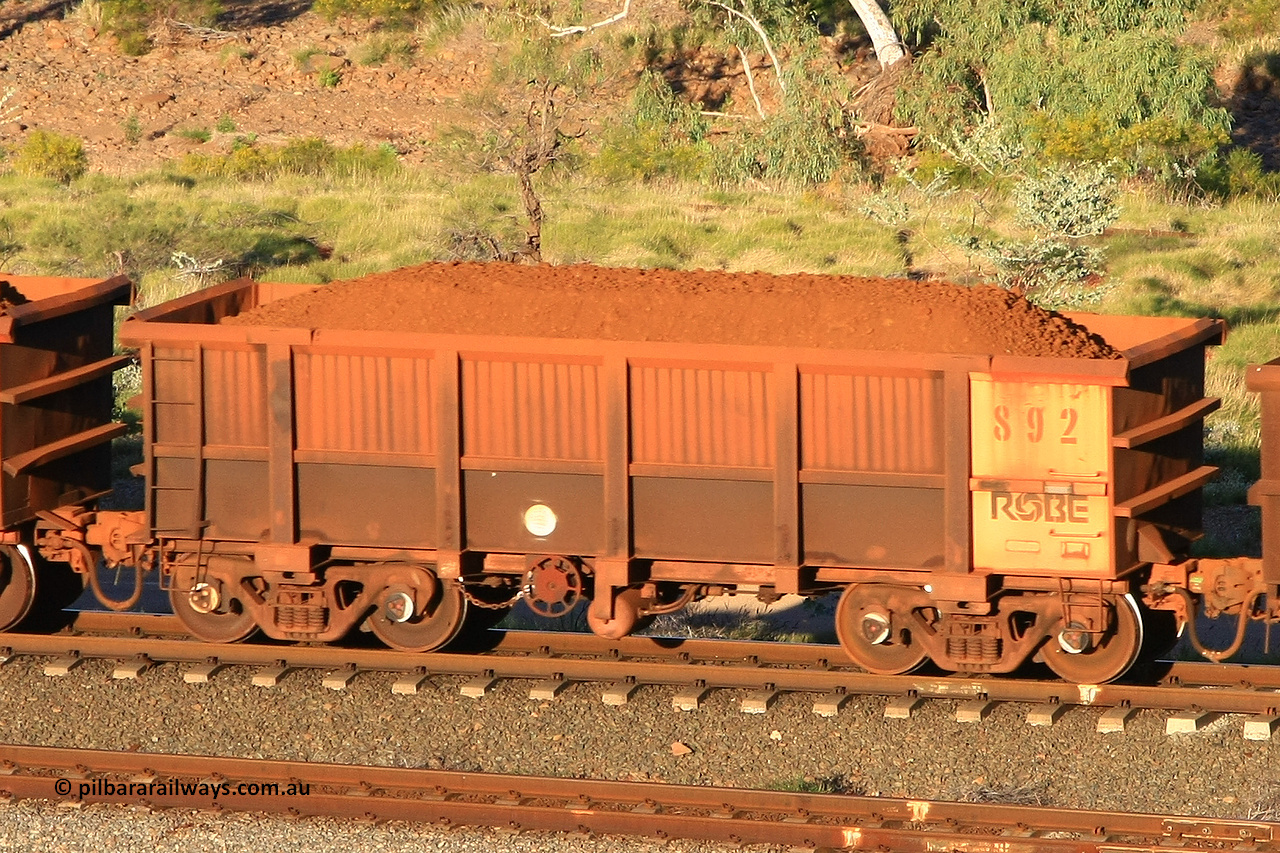 0892 110602 1608
Robe River ore waggon 892, built by Centurion Industries WA, rotary coupler end handbrake side loaded view at the 71 km, Western Creek on the Deepdale line. June 2, 2011.
Keywords: 892;Centurion-Industries-WA;Robe-ore-waggon;