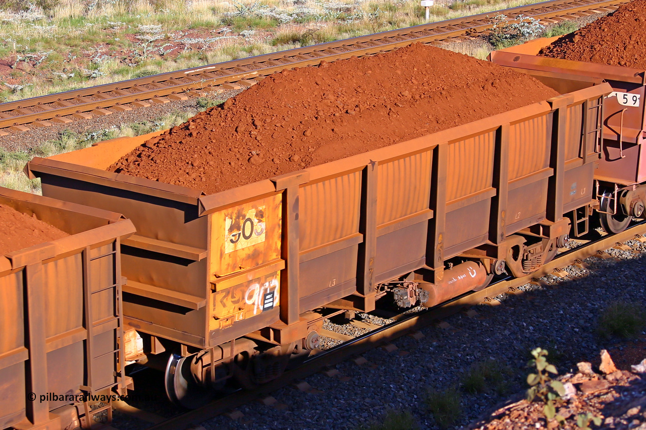 0903 210322 9684
Robe River ore waggon 903, built by Centurion Industries  WA, rotary coupler end non-handbrake side loaded view at the 17 km on the Cape Lambert line, March 22, 2021.
Keywords: 903;Centurion-Industries-WA;Robe-ore-waggon;
