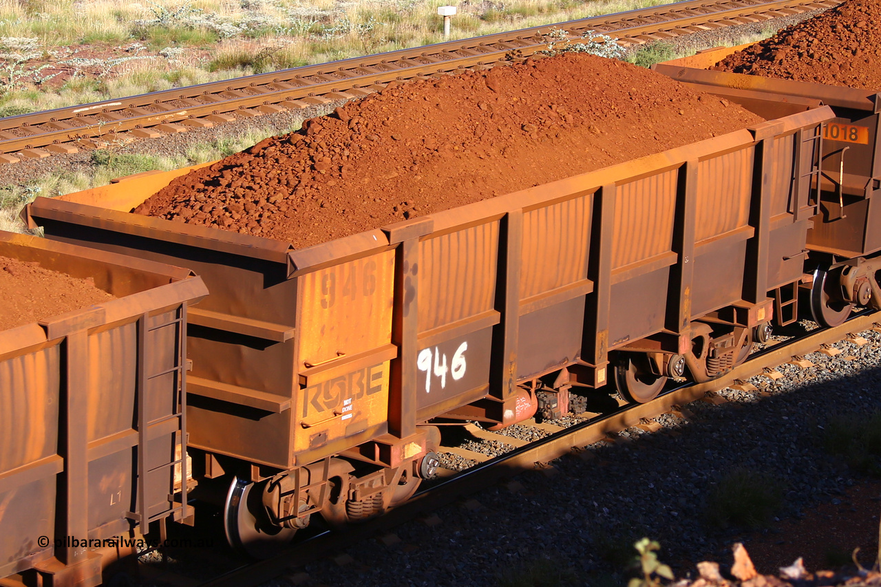 0946 210322 9791
Robe River ore waggon 946, built by Centurion Industries  WA, rotary coupler end non-handbrake side loaded view at the 17 km on the Cape Lambert line, March 22, 2021.
Keywords: 946;Centurion-Industries-WA;Robe-ore-waggon;