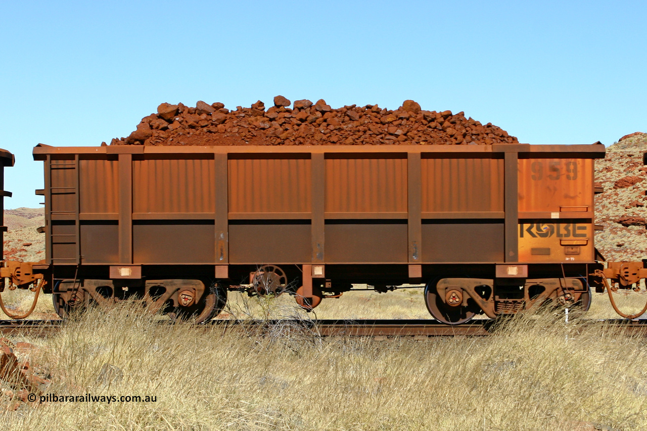 0959 060722 7526
Robe River ore waggon 959, built by Centurion Industries WA, handbrake side loaded view at the 78.8 km between Western Creek and Maitland on the Deepdale line. July 22, 2006.
Keywords: 959;Centurion-Industries-WA;Robe-ore-waggon;