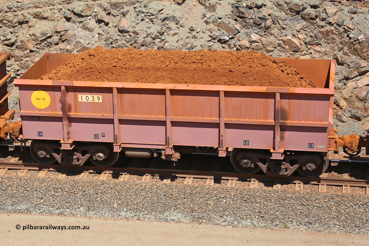 1039 160306 1593
Robe River ore waggon 1039, built by Bradken Rail Qld in April 2012, fixed coupler non-handbrake side loaded view, at the 45 km, Harding Siding on the Cape Lambert line. March 6, 2016.
Keywords: 1039;Bradken-Rail-Qld;Robe-ore-waggon;