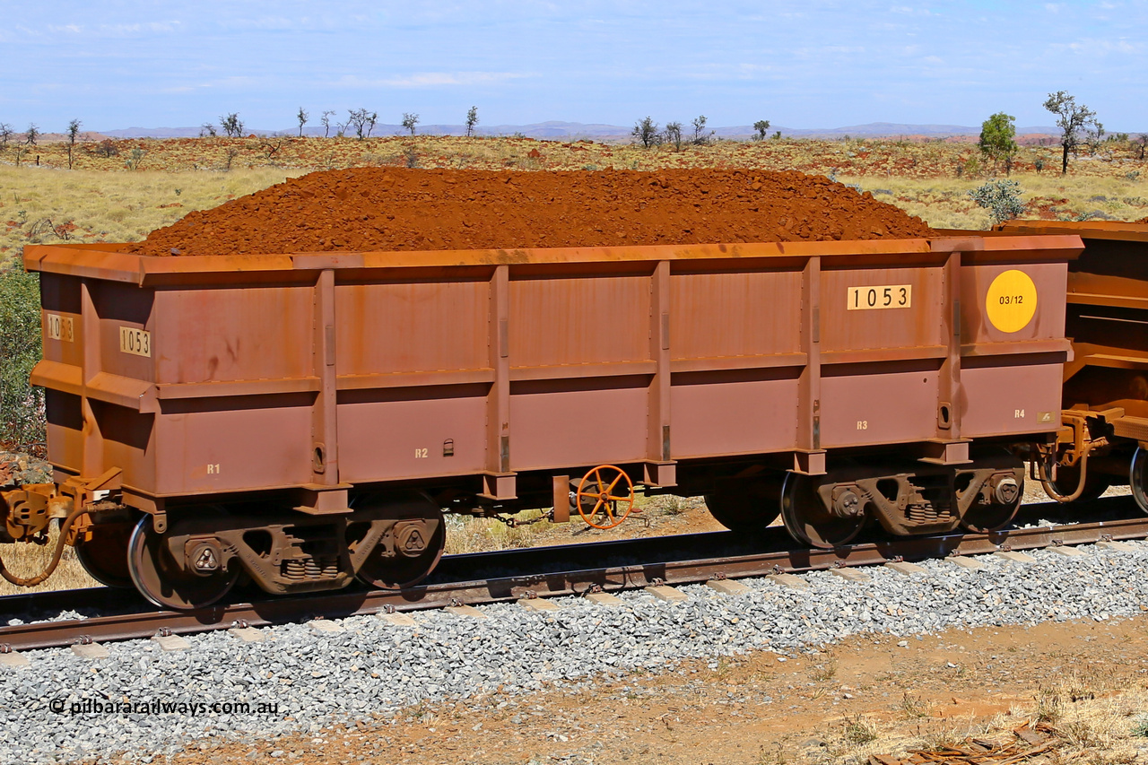 1053 170729 0213
Robe River ore waggon 1053, built by Bradken Rail Qld in March 2012, fixed coupler handbrake side loaded view at the 103 km, between Maitland Siding and the Fortescue River on the Deepdale line. July 29, 2017.
Keywords: 1053;Bradken-Rail-Qld;Robe-ore-waggon;