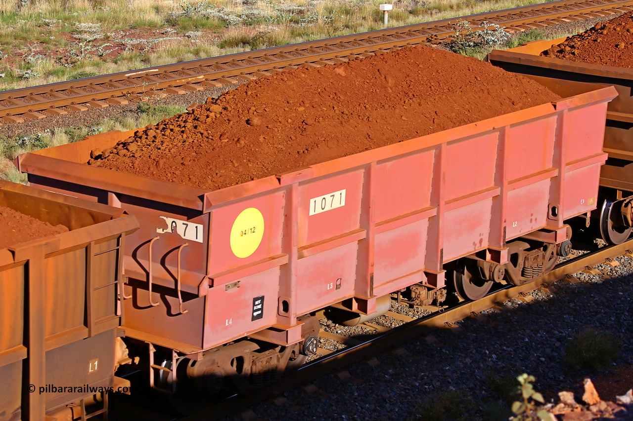 1071 210322 9774
Robe River ore waggon 1071, built by Bradken Rail Qld in April 2012, rotary coupler end non-handbrake side loaded view, at the 17 km on the Cape Lambert line, March 22, 2021.
Keywords: 1071;Bradken-Rail-Qld;Robe-ore-waggon;