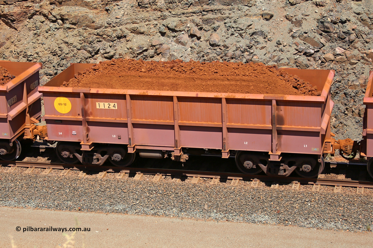 1124 160306 1616
Robe River ore waggon 1124, built by Bradken Rail Qld in May 2012, fixed coupler non-handbrake side loaded view, at the 45 km, Harding Siding on the Cape Lambert line. March 6, 2016.
Keywords: 1124;Bradken-Rail-Qld;Robe-ore-waggon;