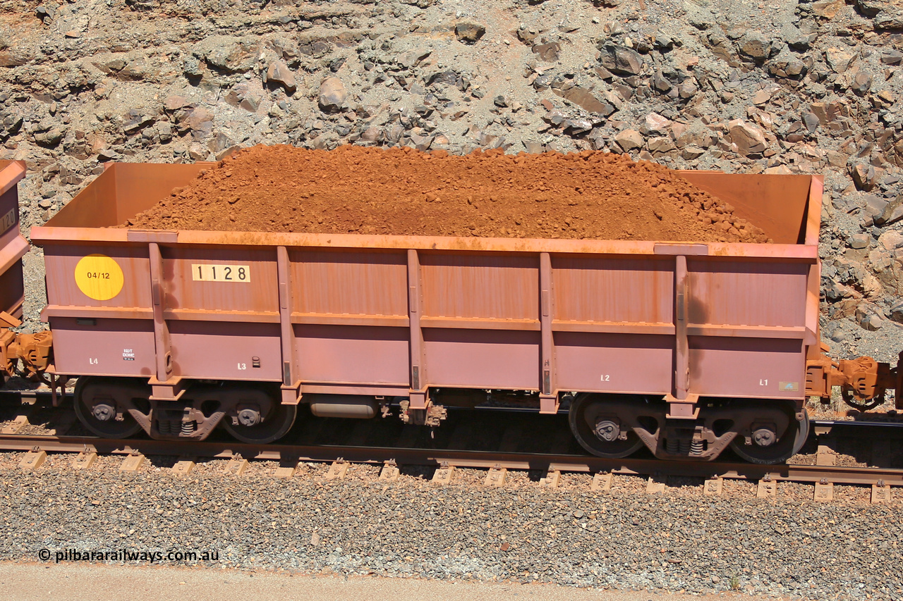 1128 160306 1564
Robe River ore waggon 1128, built by Bradken Rail Qld in March 2012, fixed coupler non-handbrake side loaded view, at the 45 km, Harding Siding on the Cape Lambert line. March 6, 2016.
Keywords: 1128;Bradken-Rail-Qld;Robe-ore-waggon;